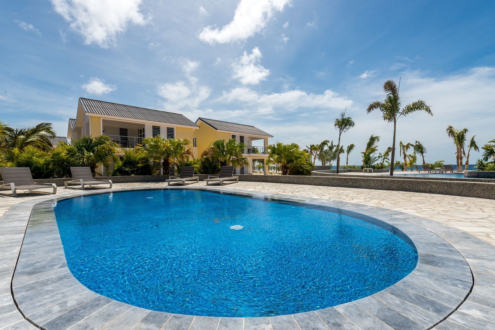 curacao exclusief jan thiel zwembad bonaire punt vierkant delfins beach resort zeezicht villa